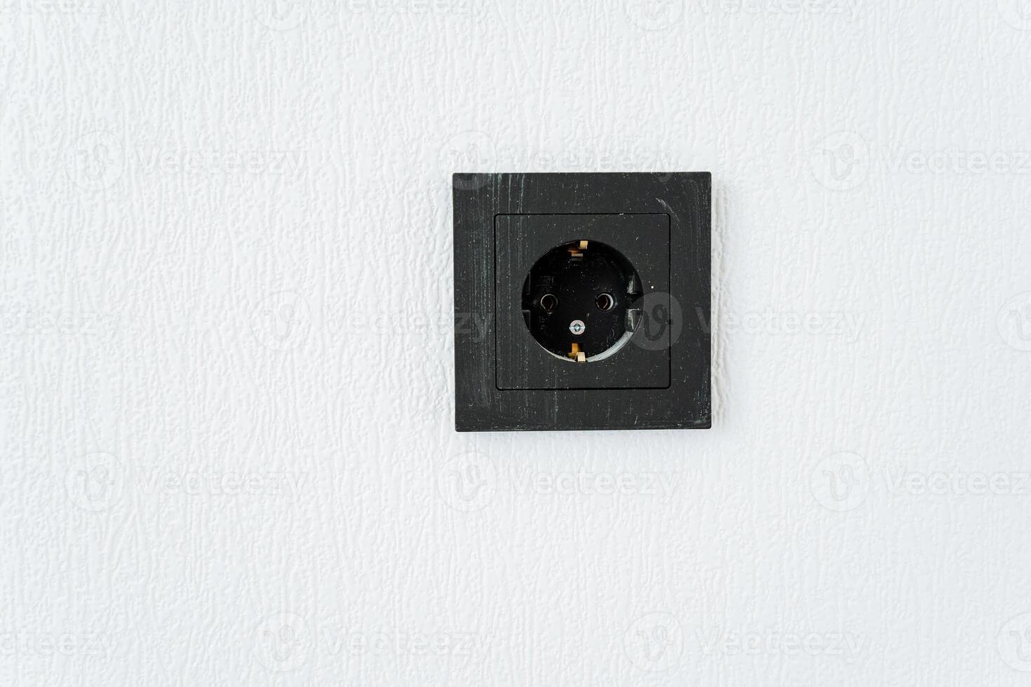 electrical outlet on a white wall photo