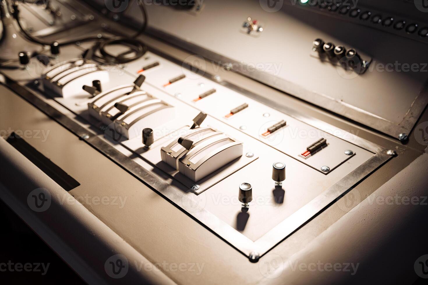A close up of a control panel with a light on it photo