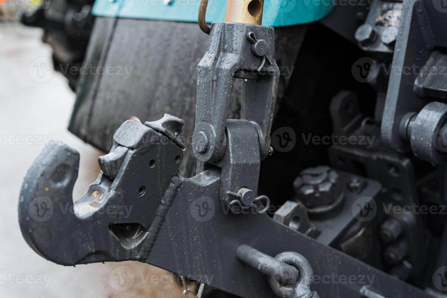 Close up of a tractor with a chain attached photo