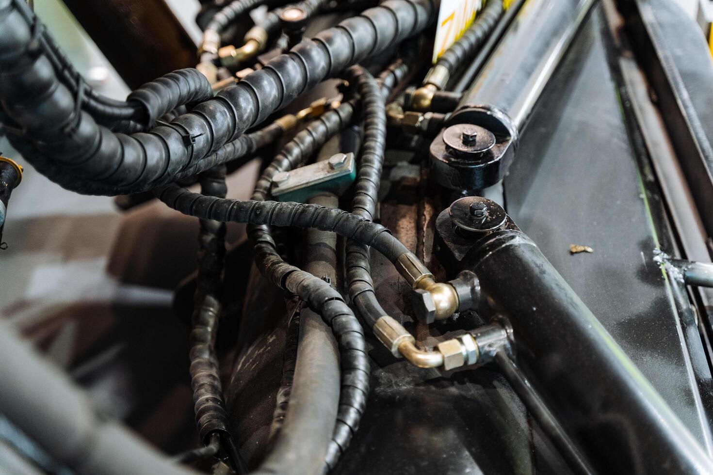 The inside of a vehicle with many wires photo