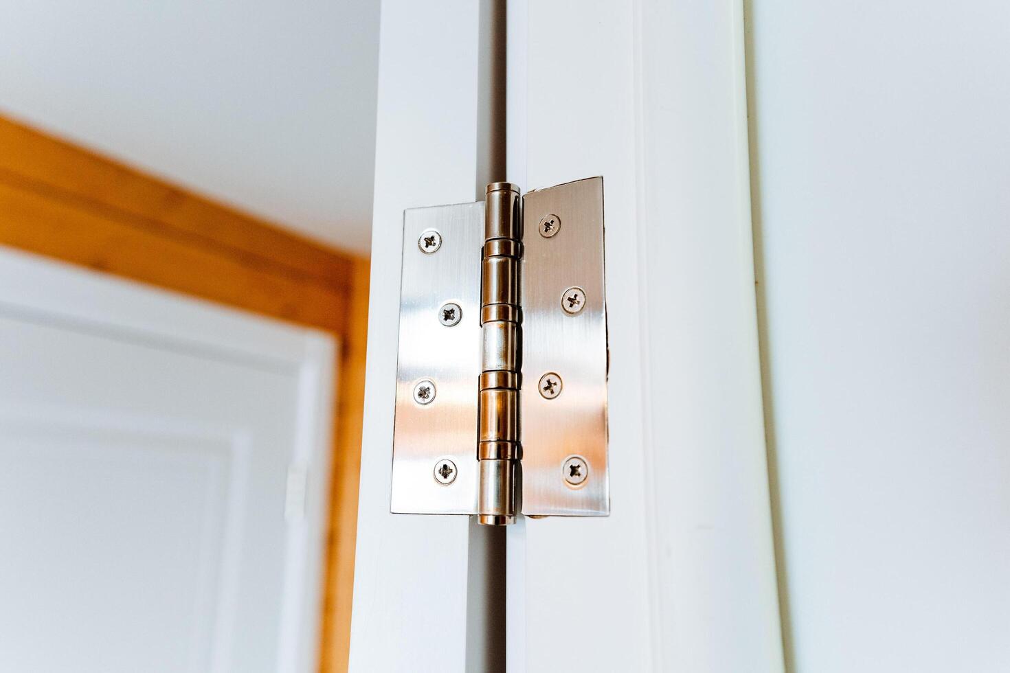 close up of door with a metal hinge photo