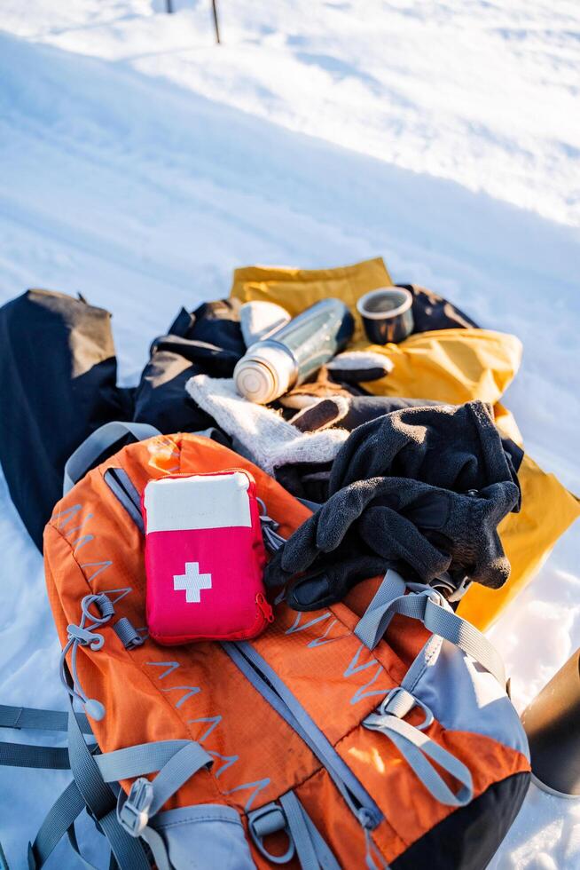 A backpack with a red cross on it photo