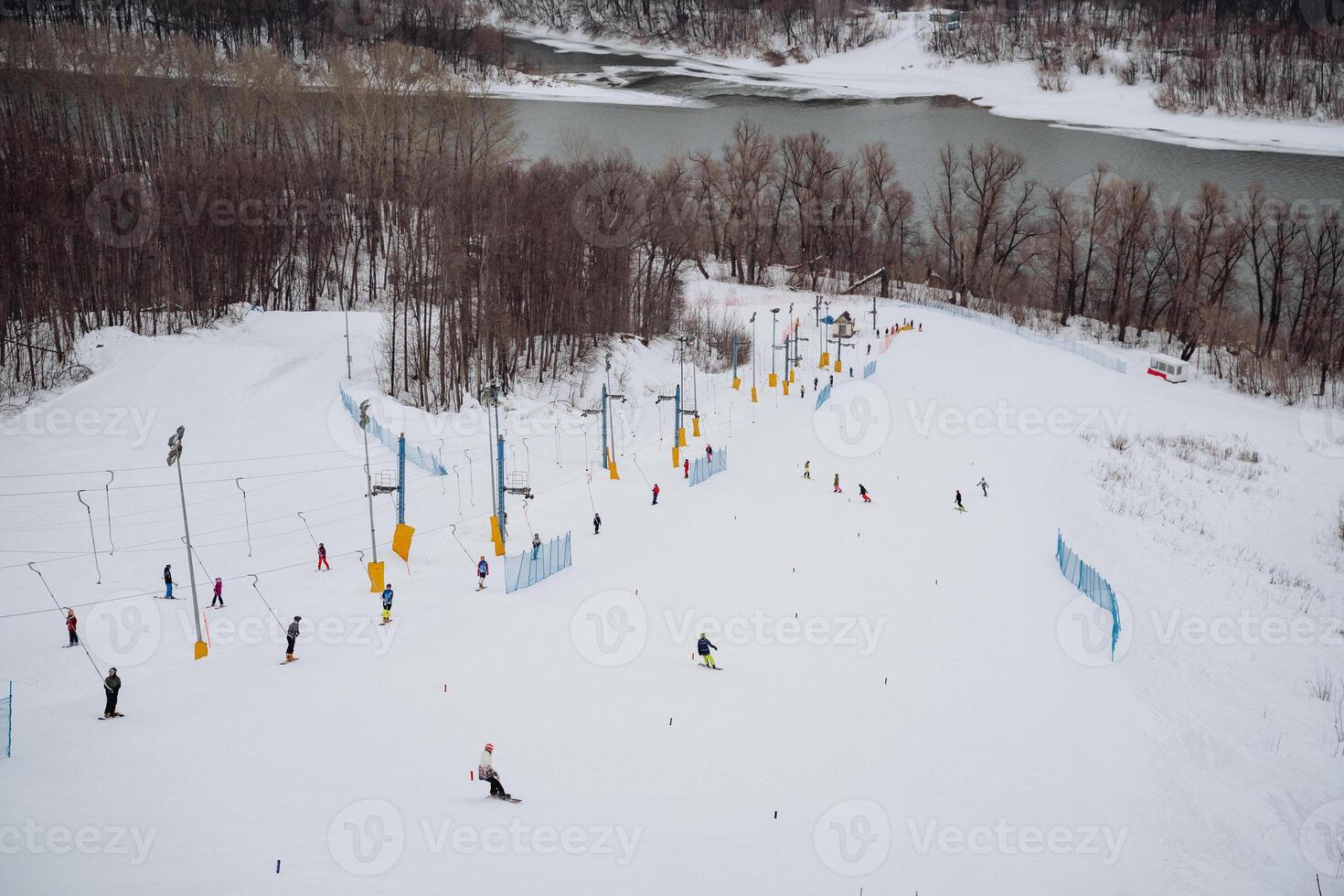 Winter Sports Adventure Skiers and snowboarders thrill in the stunning mountain trail, surrounded by snowy nature, making every moment memorable and exhilarating photo