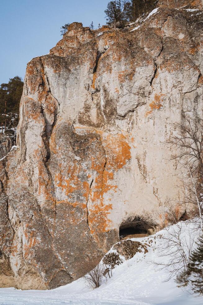 This stunning rock formation prominently features a captivating cave located right at its center, showcasing the breathtaking beauty and diversity of natures remarkable geological wonders photo
