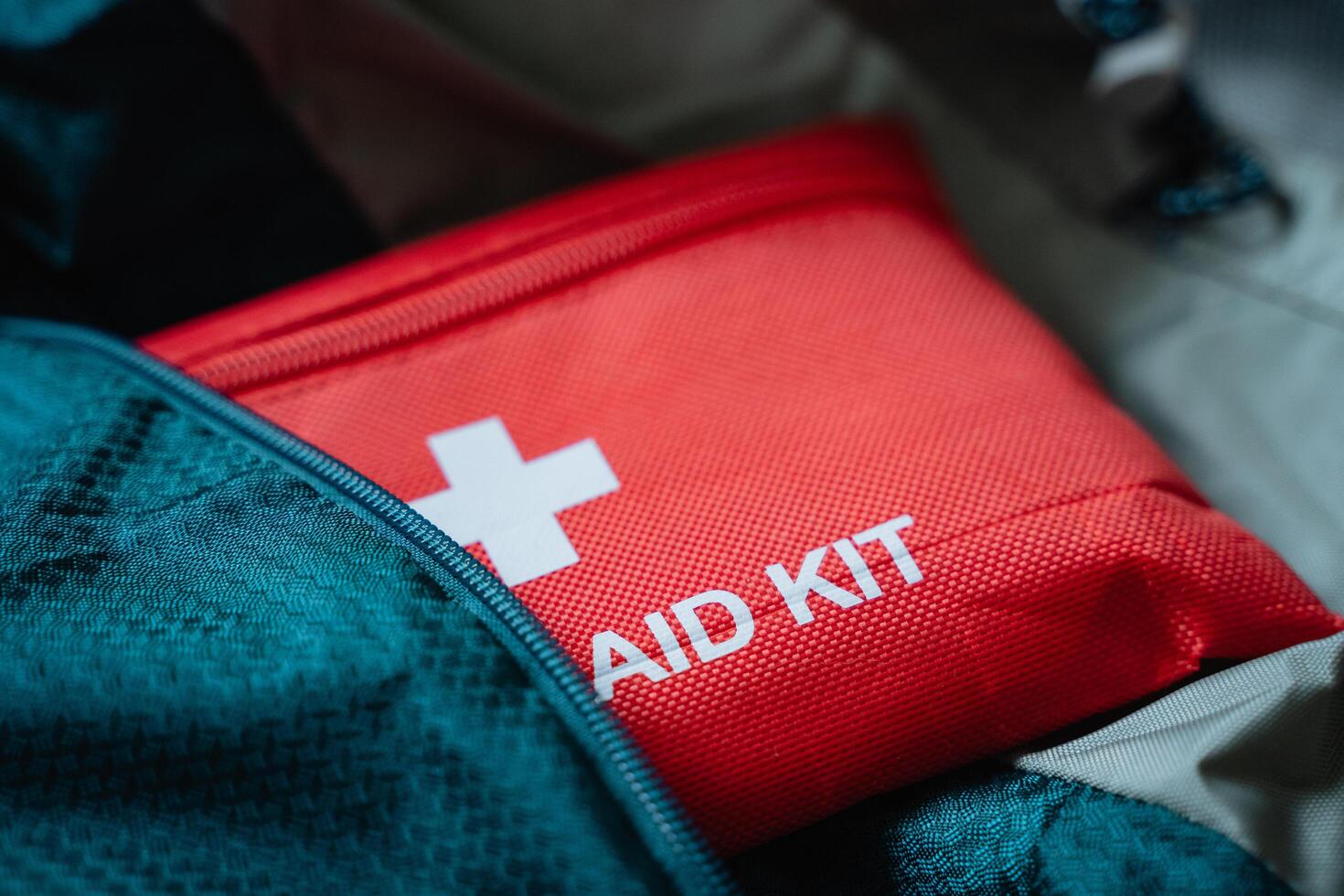The Essential Red First Aid Kit is specifically designed for Emergency Preparedness, perfect for both Outdoor Adventures and enhancing Indoor Safety during unforeseen situations photo