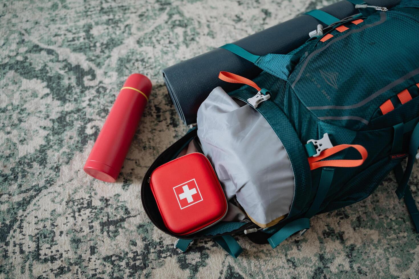 This durable, versatile backpack is perfect for outdoor adventures. It includes a first aid kit and thermos, ensuring youre wellprepared for hiking and nature exploration photo