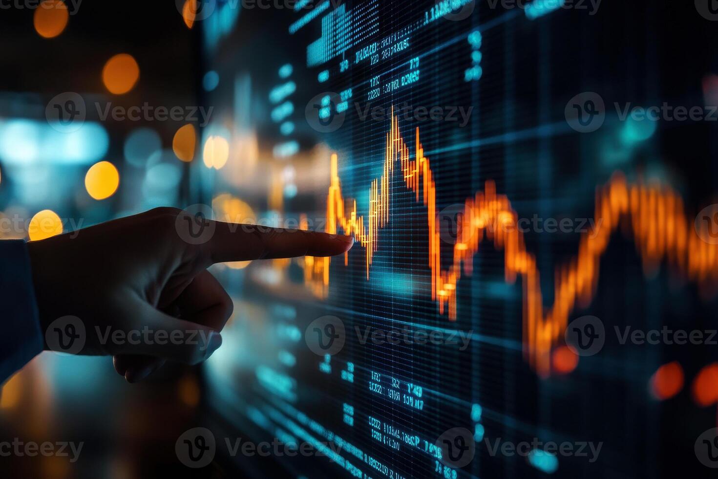 A business person interacting with charts and diagrams on a stock market screen... photo
