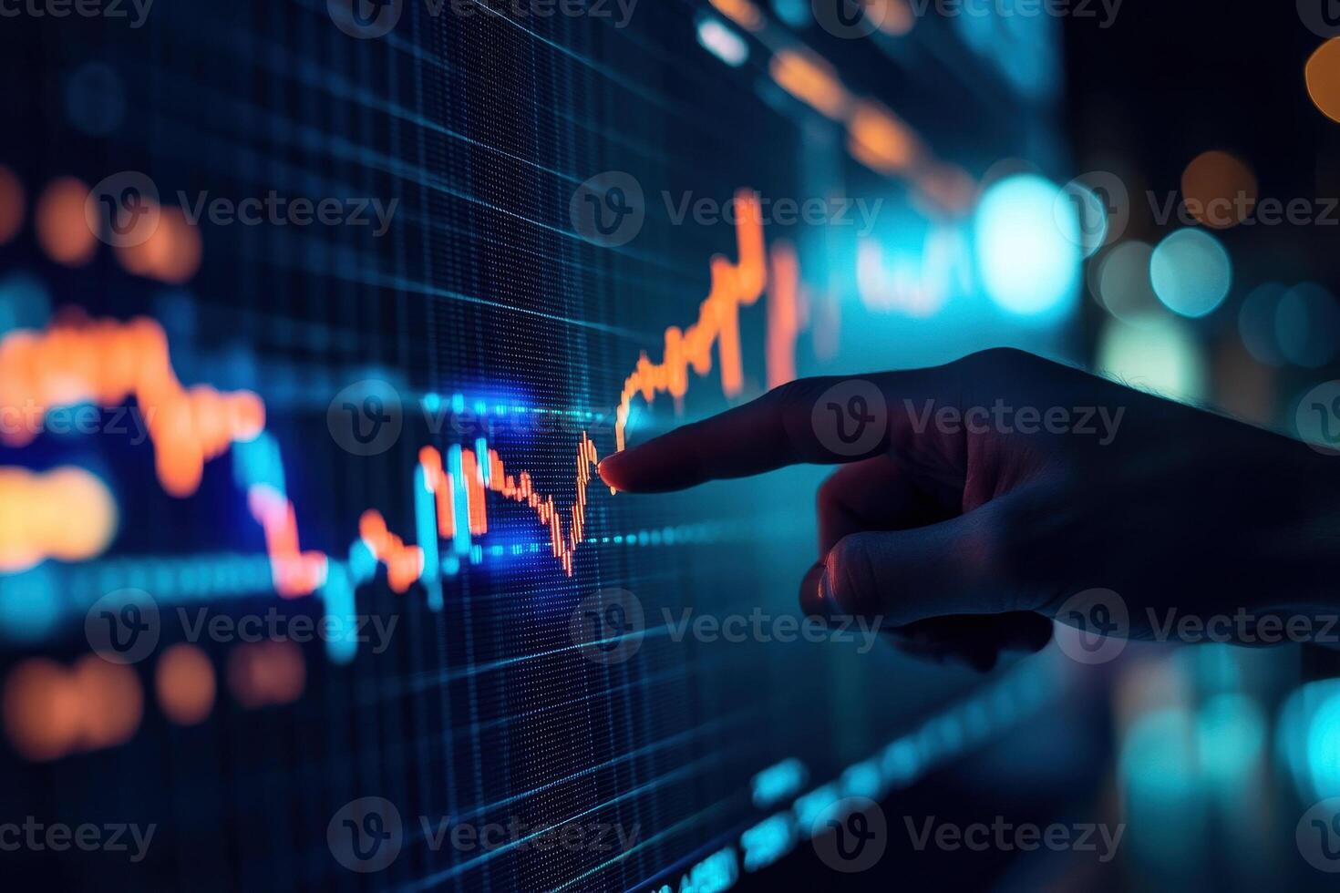 business person interacting with charts and diagrams on a stock market screen. photo