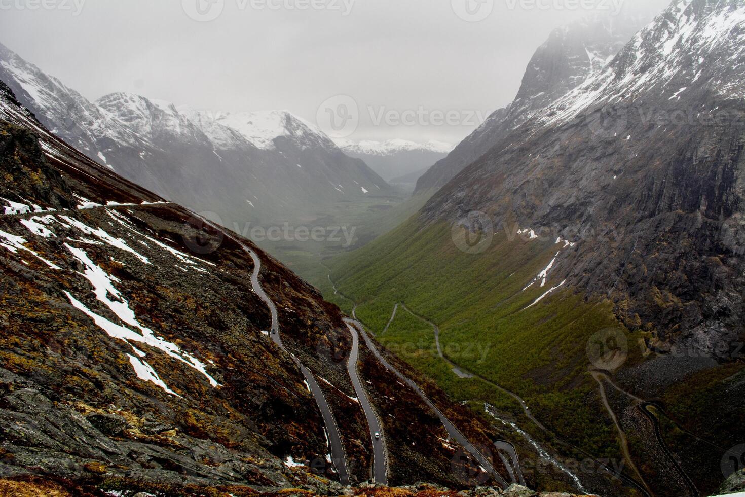 View on the famous Trollstigen mountain road with hairpins during late spring in Norway photo