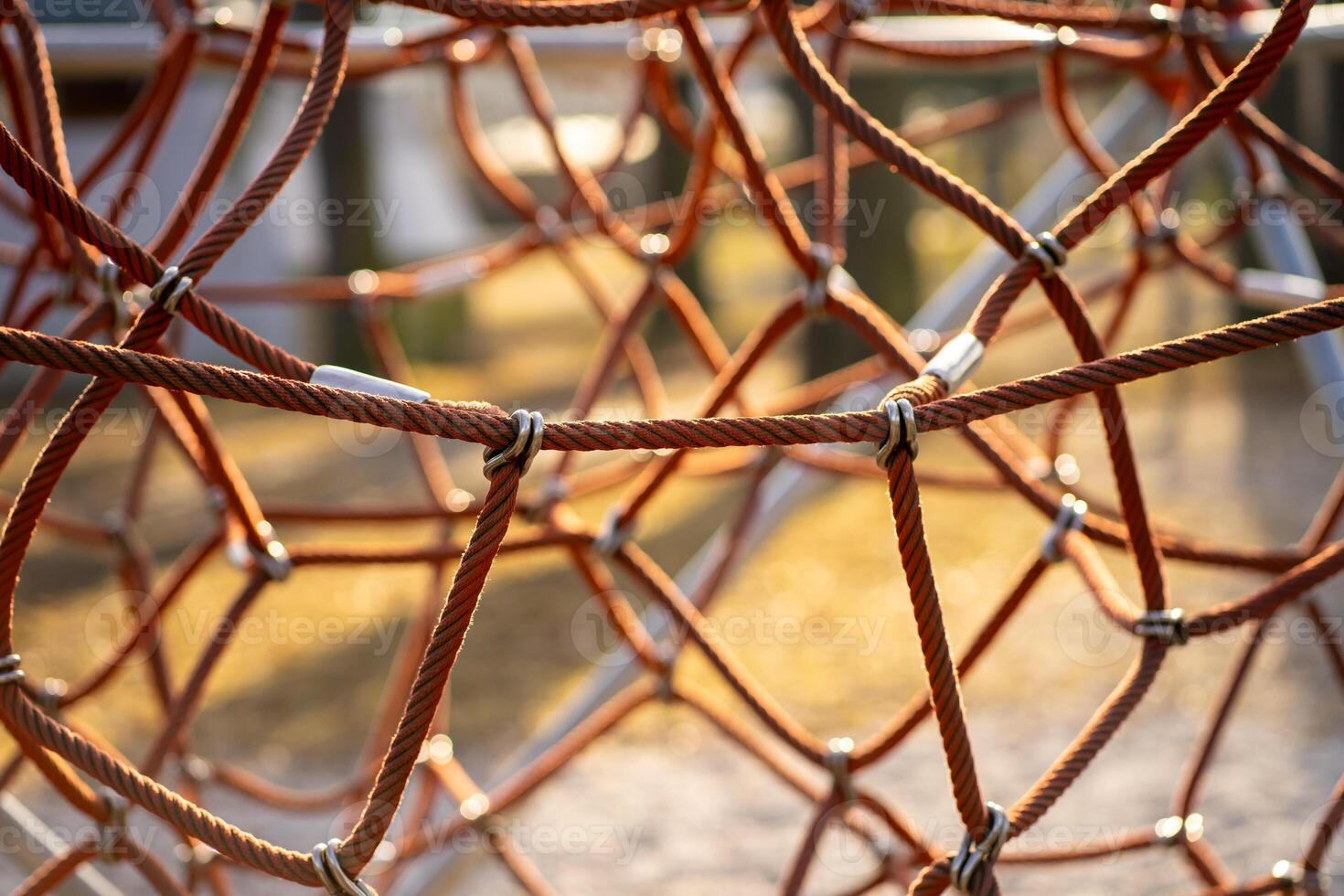 View of an alpine trellis on a playground in a public park photo