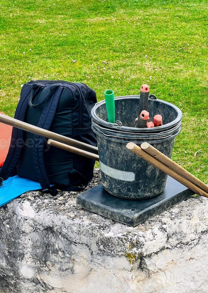 View of garden tools. Bucket and garden tools. Workers tools for spring cleaning photo