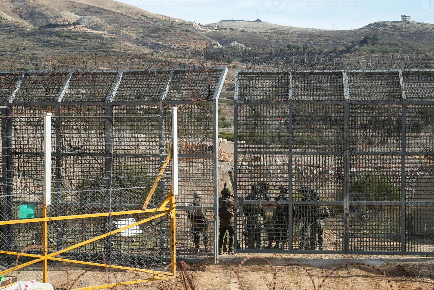 Large Border Gate Guards Patrolling Area photo