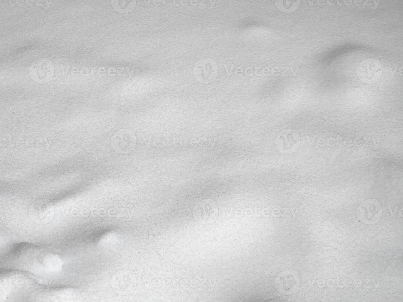 Snowdrifts. Field with snow. Snow drifts on the field photo
