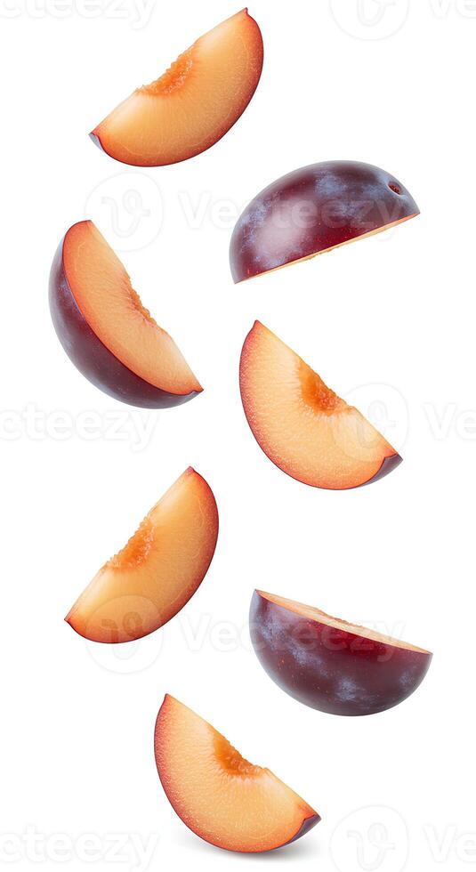 Fresh plum slices tumbling on white background. Juicy plum wedges falling down on white background. Ripe plum pieces floating in mid-air on white photo