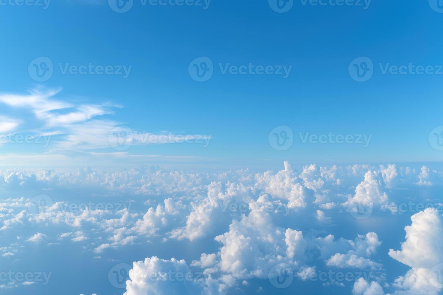 Blue sky background with cumulus clouds, view from above photo