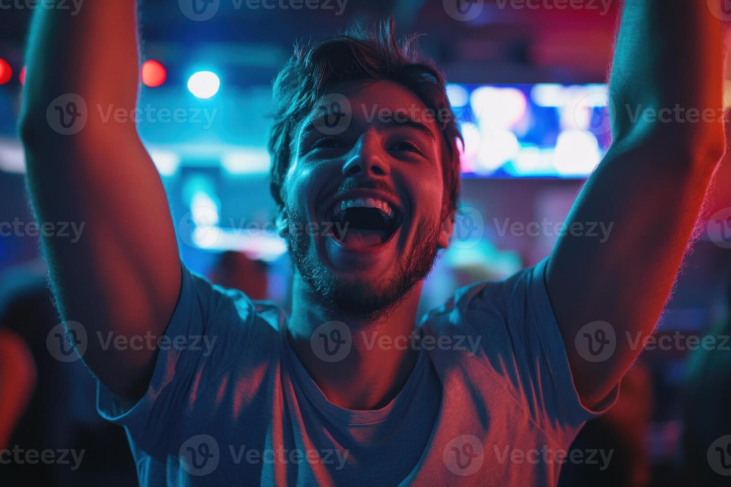 Victorious Esports Player Celebrating at a Gigapixel Event Capturing the Thrill of Competitive Gaming photo