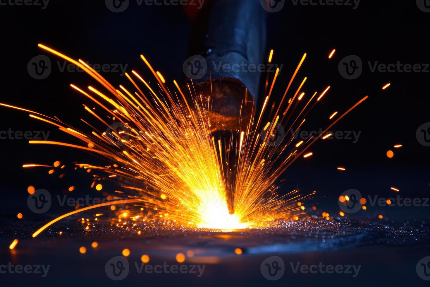 Welder Creating Sparks While Working in an Industrial Environment for Manufacturing Projects photo