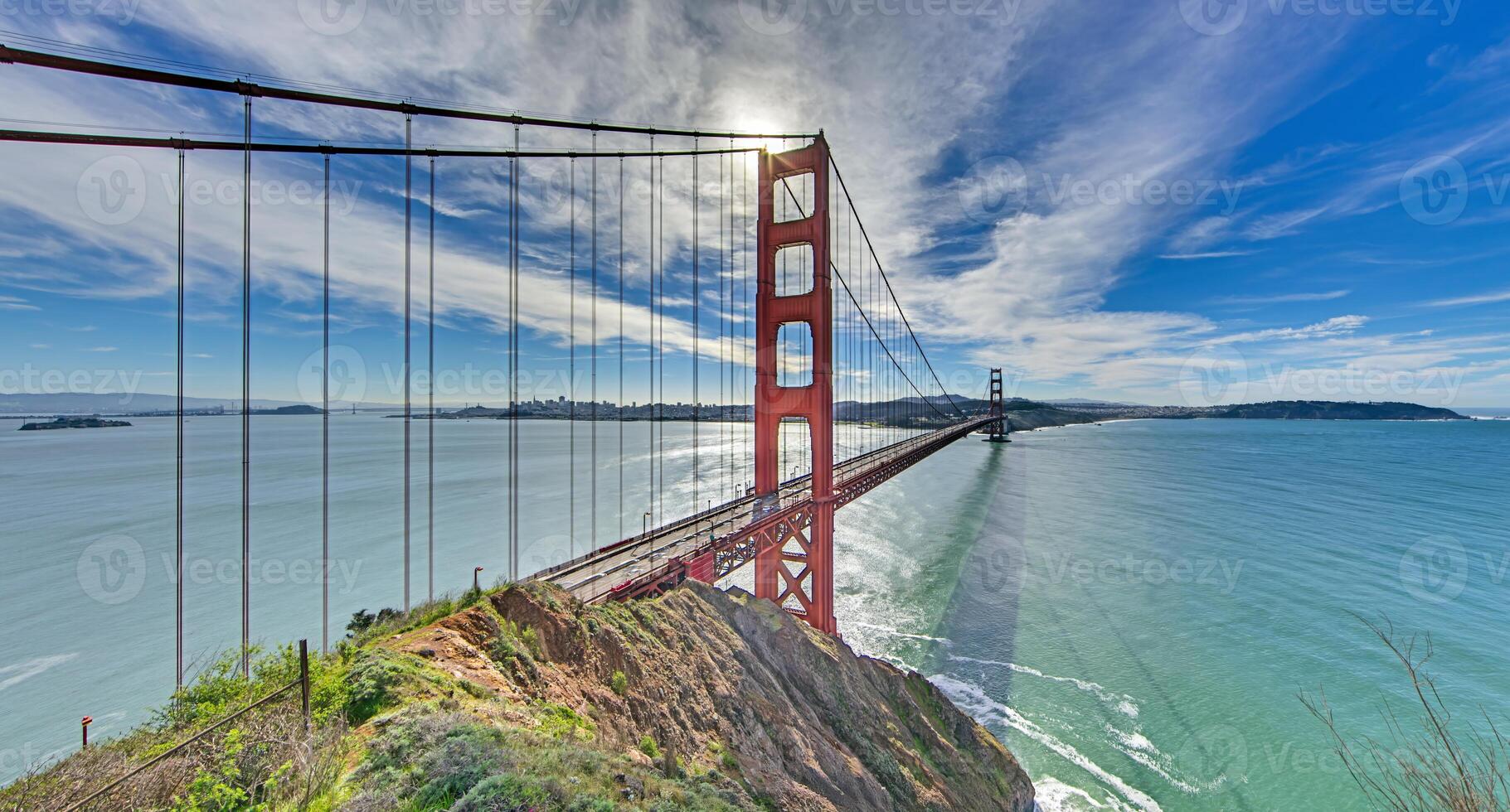 Golden Gate Bridge with blue sky and scenic ocean view from a high vantage point sa photo