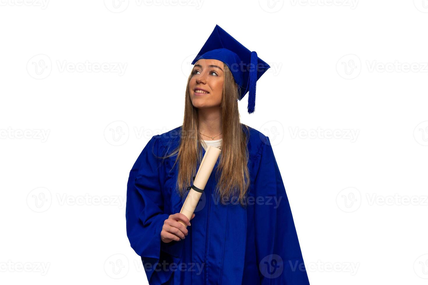 Smiling graduate student holding diploma and looking up photo