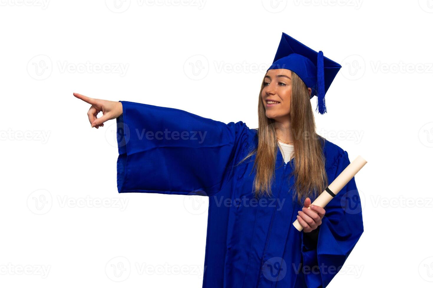 Graduated student pointing with finger on white background photo