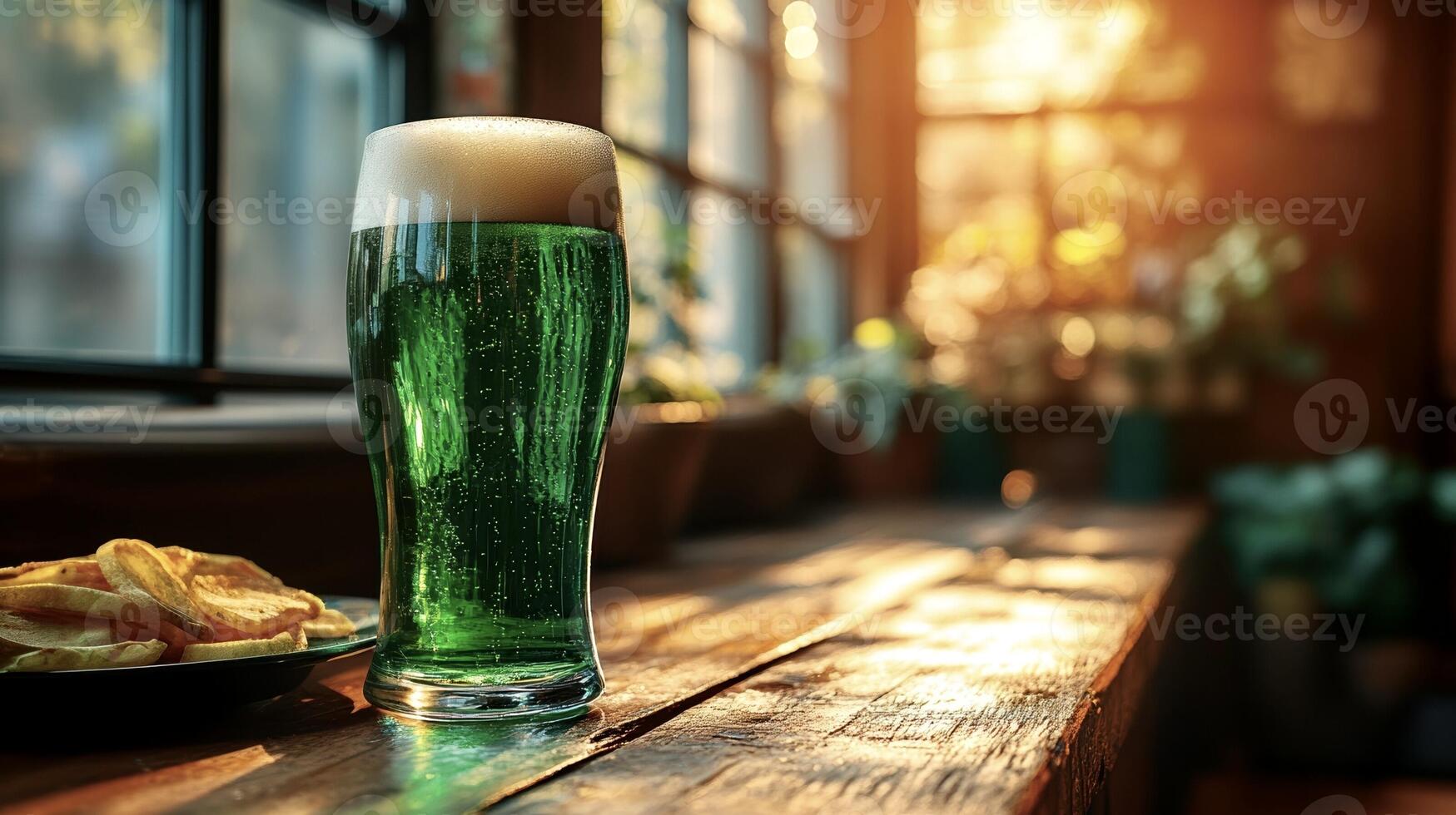 an empty pub, a glass of green beer and a plate of chips on a wooden table, the rays of the sun in the background through the window, the concept of privacy and tranquility of Patrick's photo