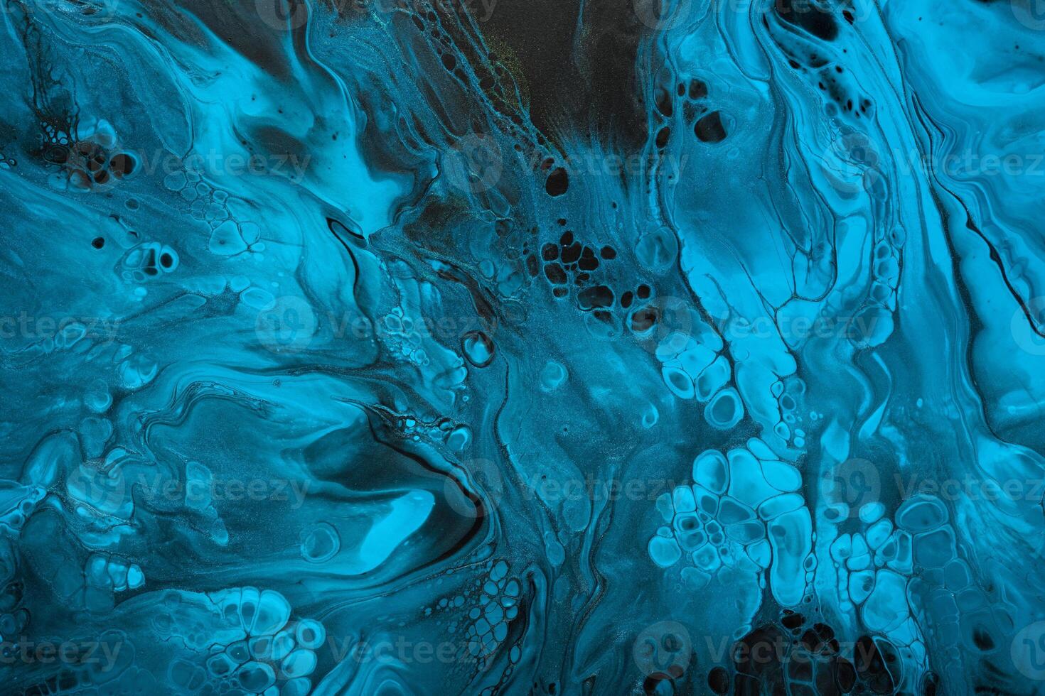 Blue abstract wave swirls on black background. Marble effect background or texture photo
