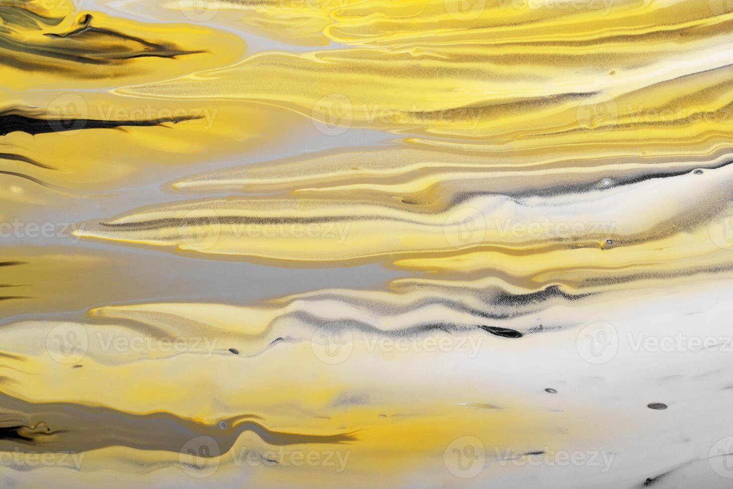 Gray, yellow and black waves flow. Marble effect background or texture. Fluid Art photo