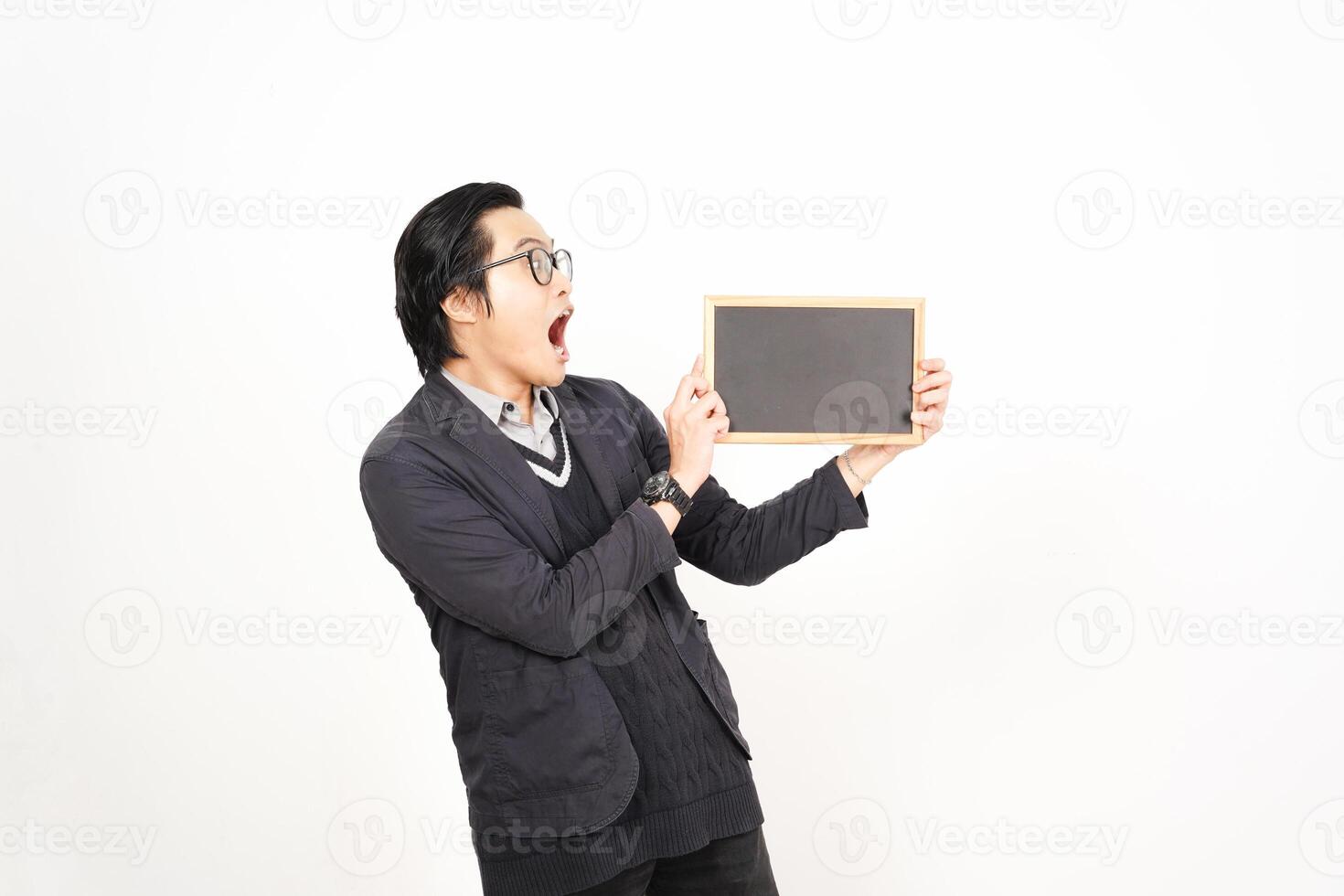A man holding a blackboard with a surprised expression photo