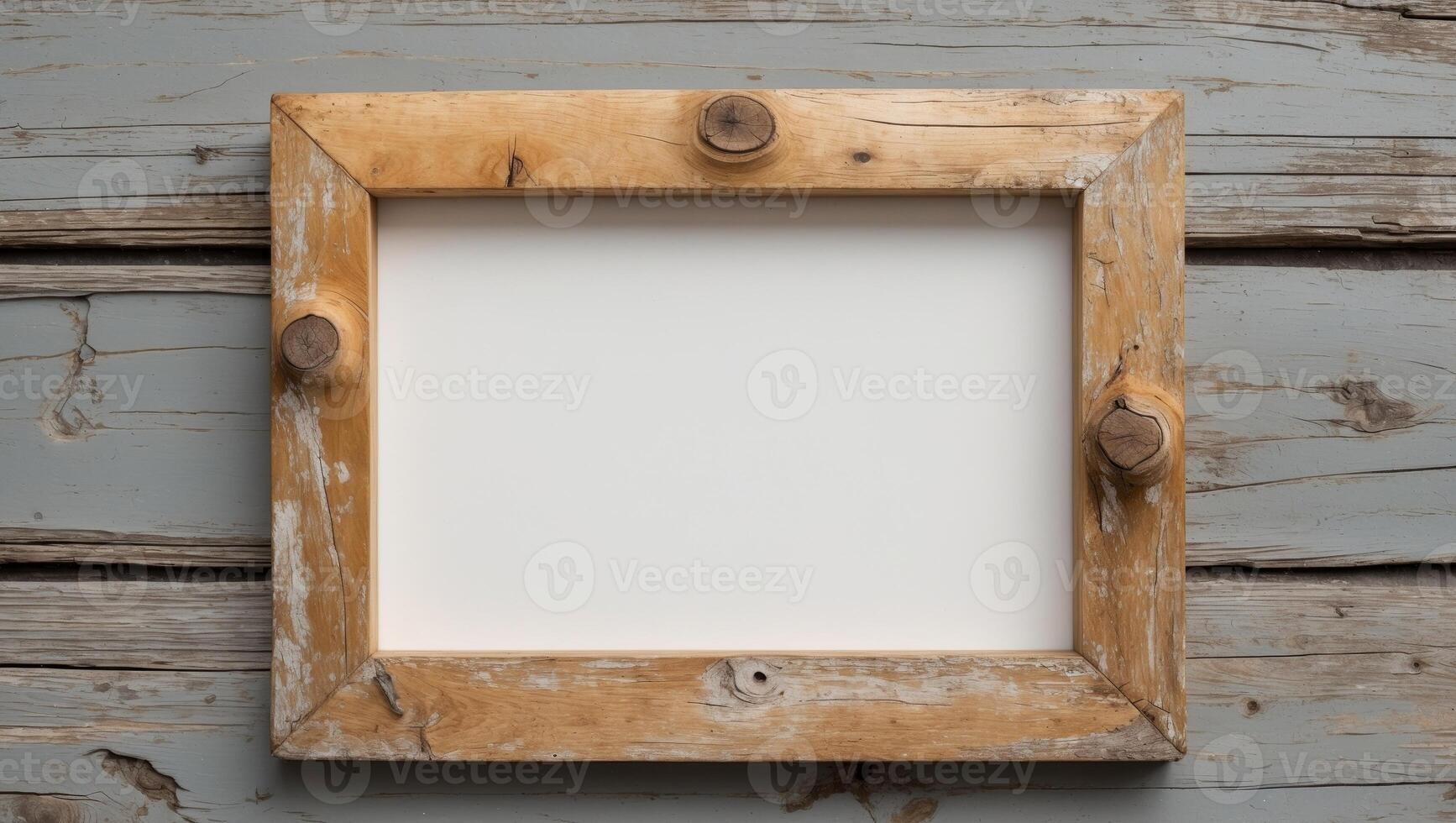 Rustic wooden frame on a weathered wooden background with ample copy space for text or images. photo