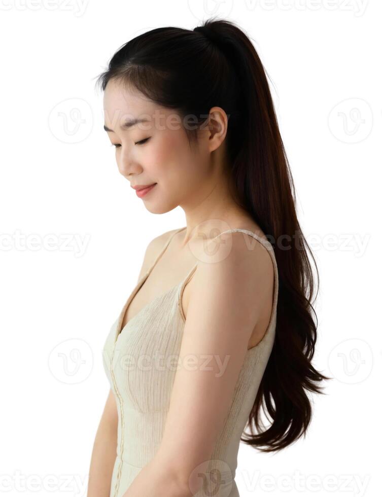 A woman in a white dress with long hair photo