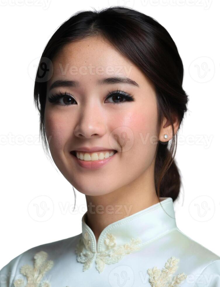 A young woman in a white dress smiling photo