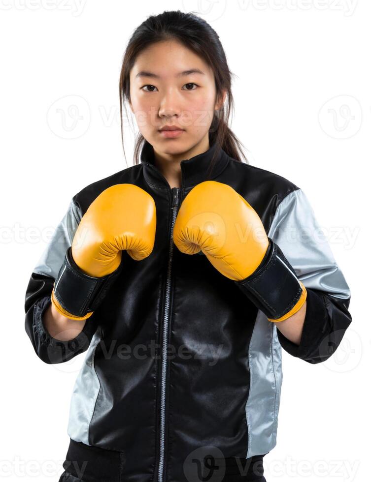 A young woman in a black jacket and yellow boxing gloves photo