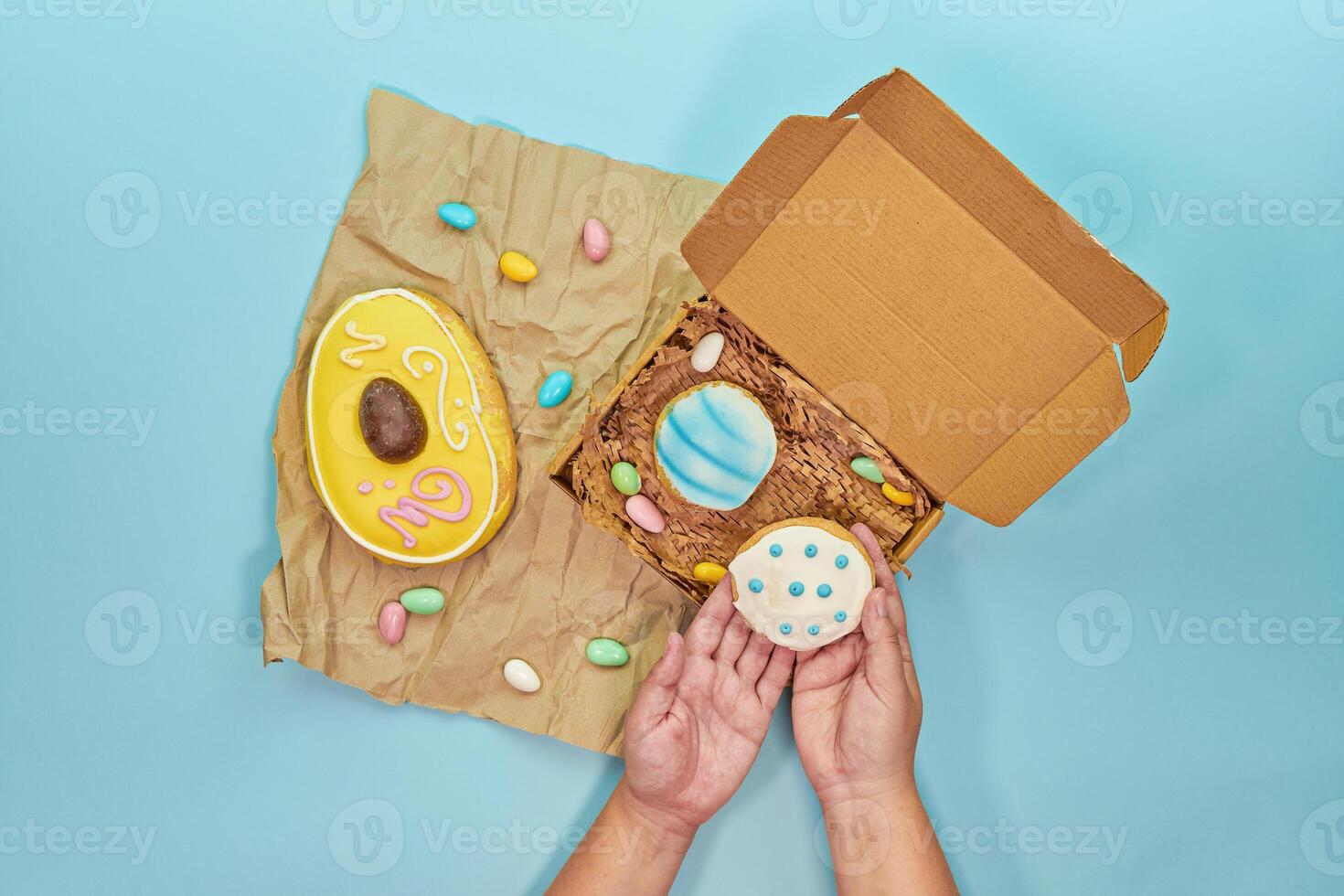 Easter baking sweets gleam on pastel backdrop, easter charm radiating extra joyful mood, easter theme blending vibrant icing and delicate shapes, enchanting families with seasonal fun photo