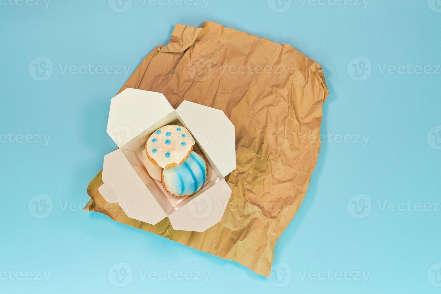 Local bakery displaying fresh Easter sweets and figolli biscuits. Local bakery fosters warm sense of community. Bakery fueling sweet gatherings with comforting dough aroma photo