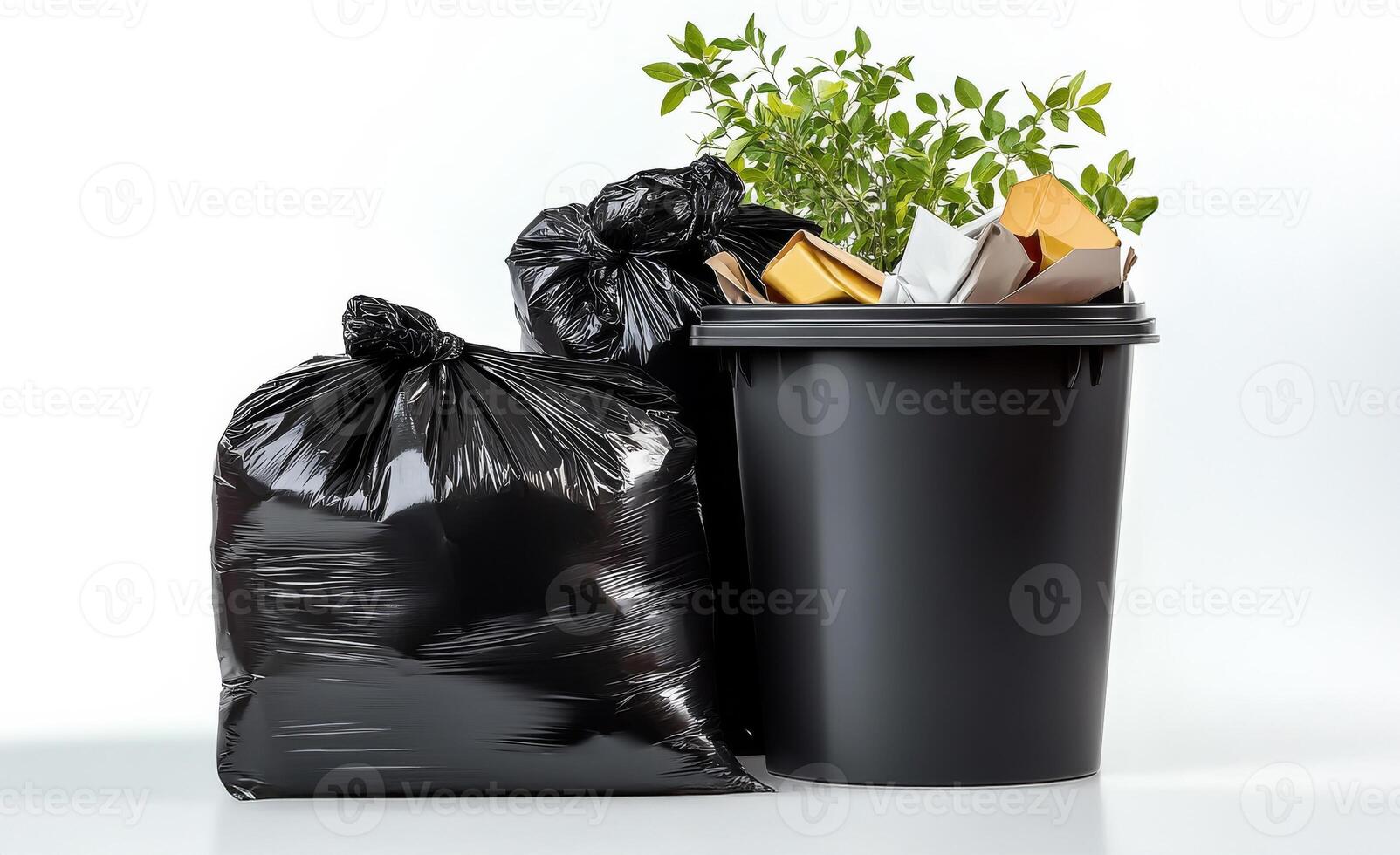 Garbage can with black garbage bags and plant photo