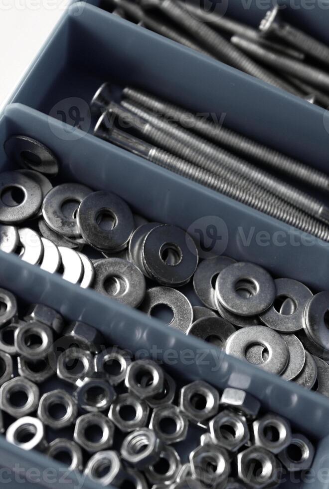 Grey Plastic Screw Box With Partitions For Nuts, Bolts And Washers Closeup View photo