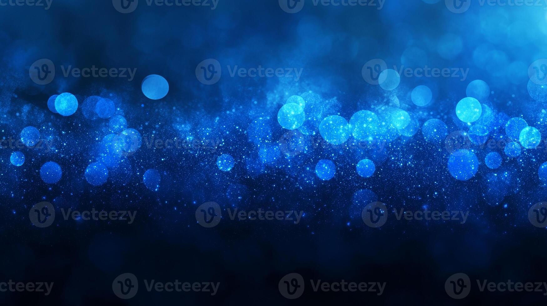 Enigmatic blue bokeh cascade sparkling on a subtly darkened backdrop photo