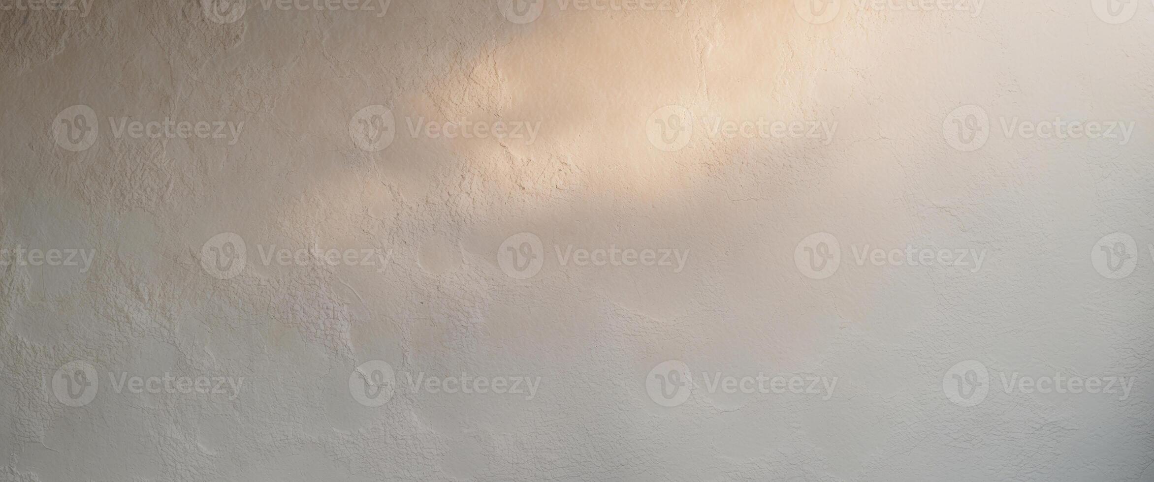 Venetian plaster texture illuminated by soft light creating a gradient effect. photo