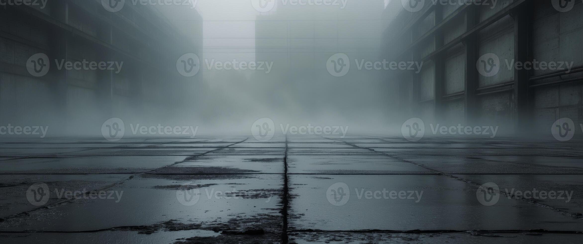 An empty street with fog and water photo