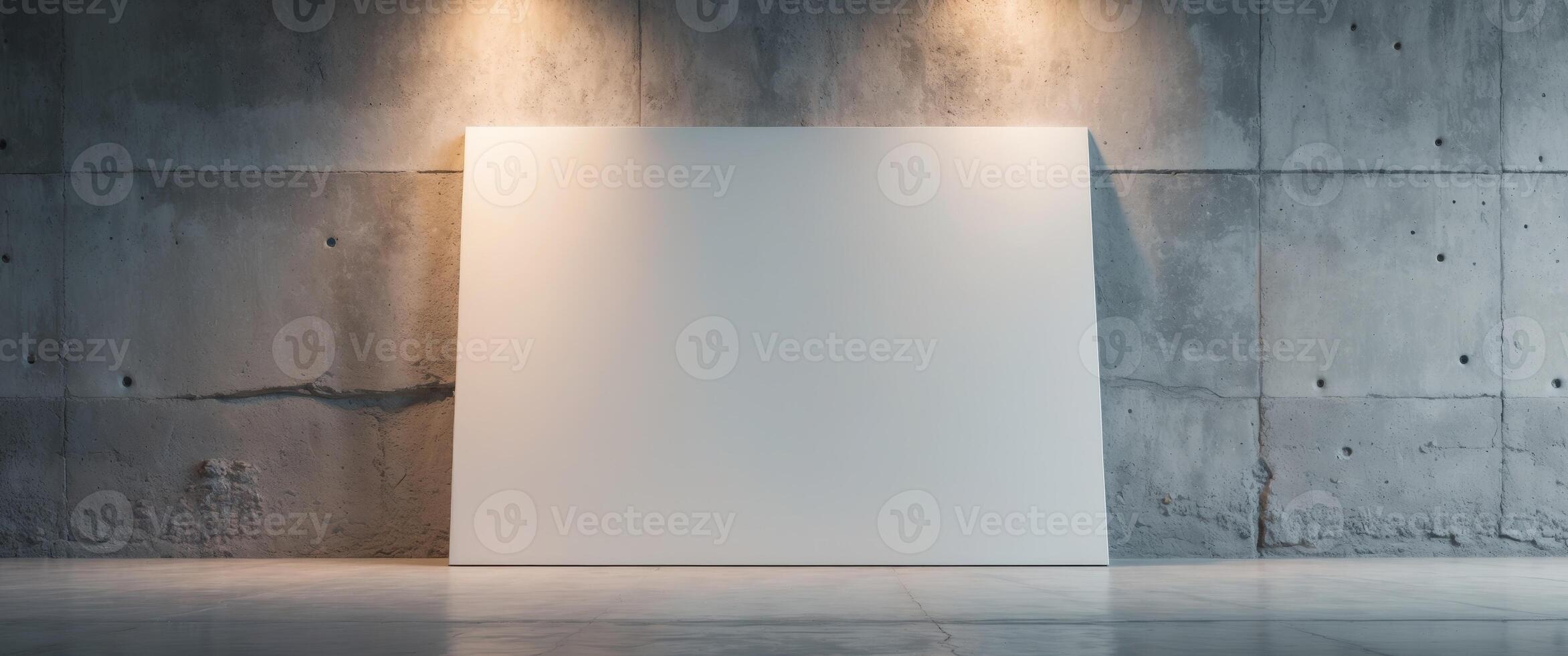 Blank canvas on empty space with concrete wall background and floor lighting photo