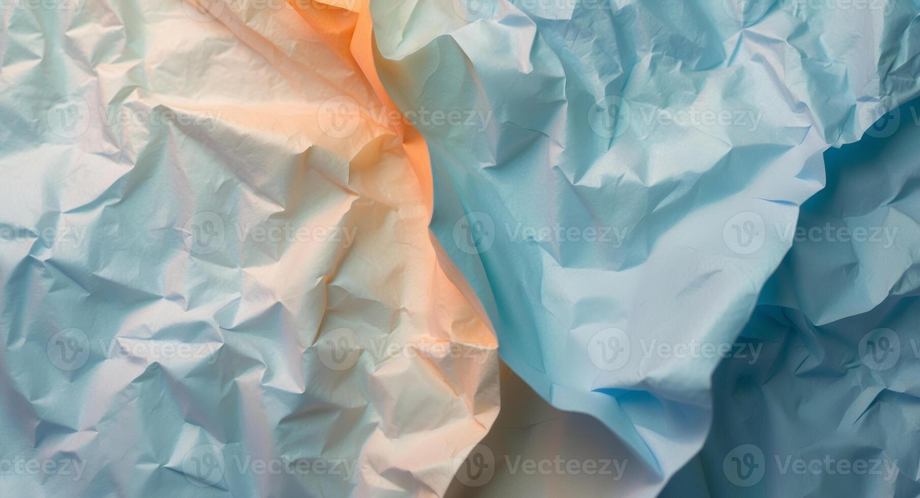 Crumpled paper background with orange and blue colors photo
