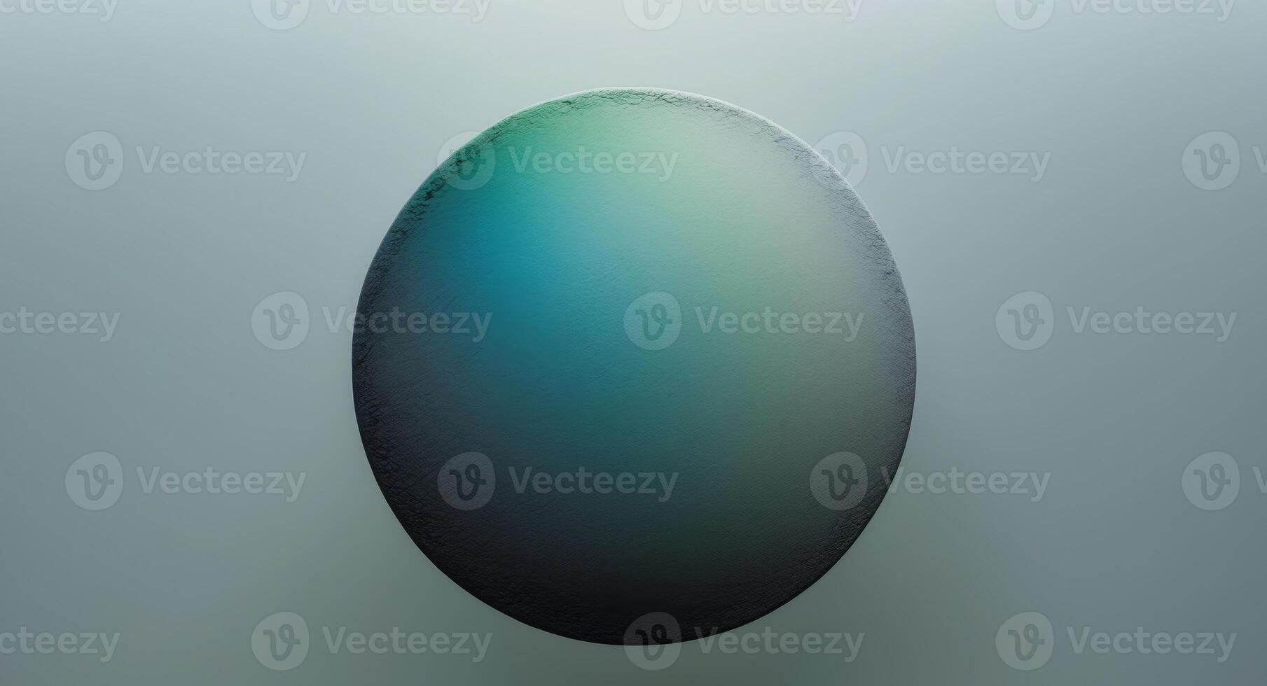 Round gradient with a rough texture going from blue green to charcoal on a see through background photo