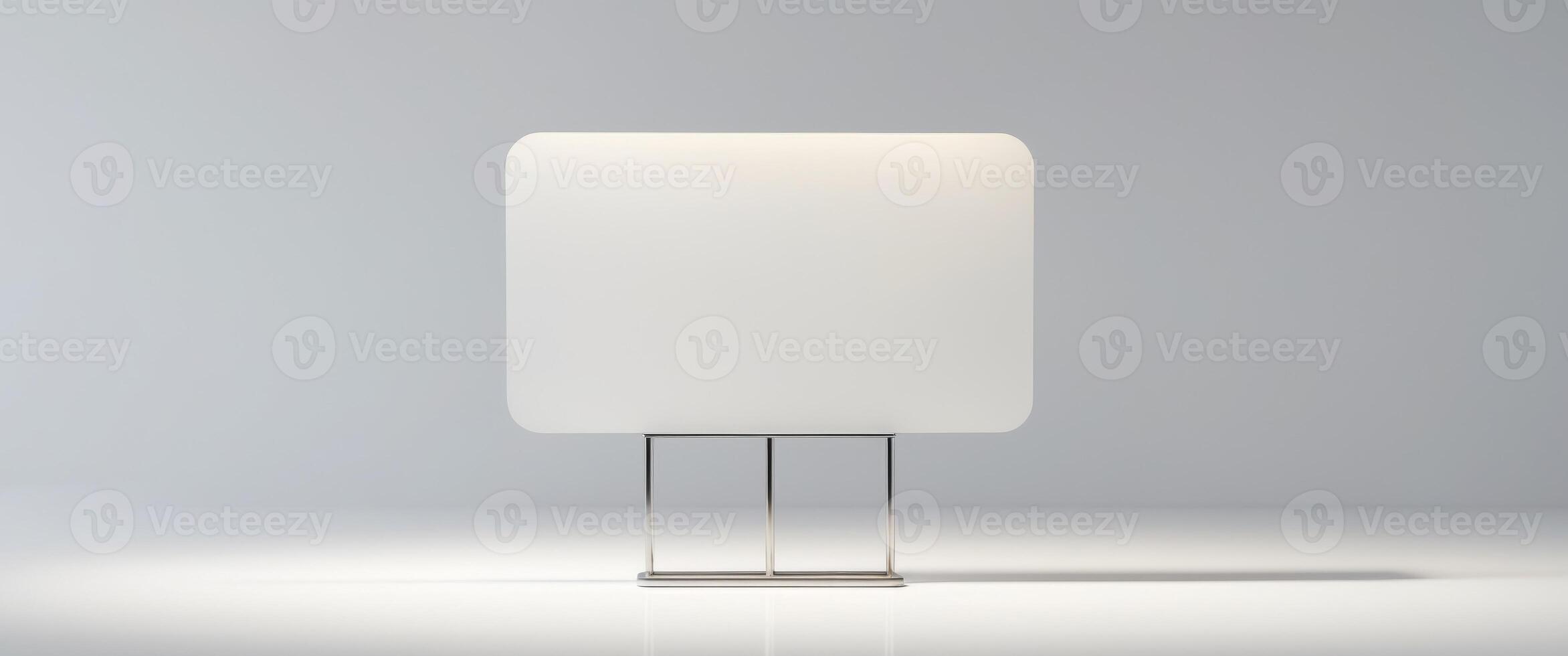 there is a white blank sign on a white stand. photo