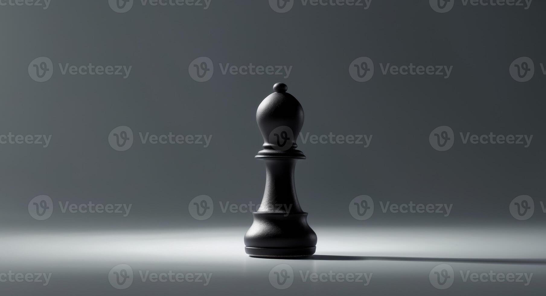 Black chess pawn positioned on a dark surface with intriguing lighting effects photo