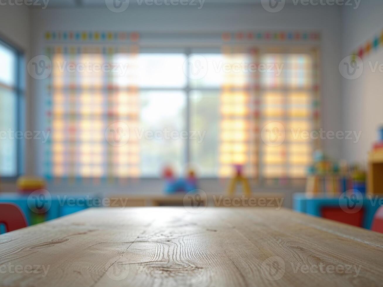 Empty wooden tabletop on blurred background of kindergarten with big window and colorful furniture photo