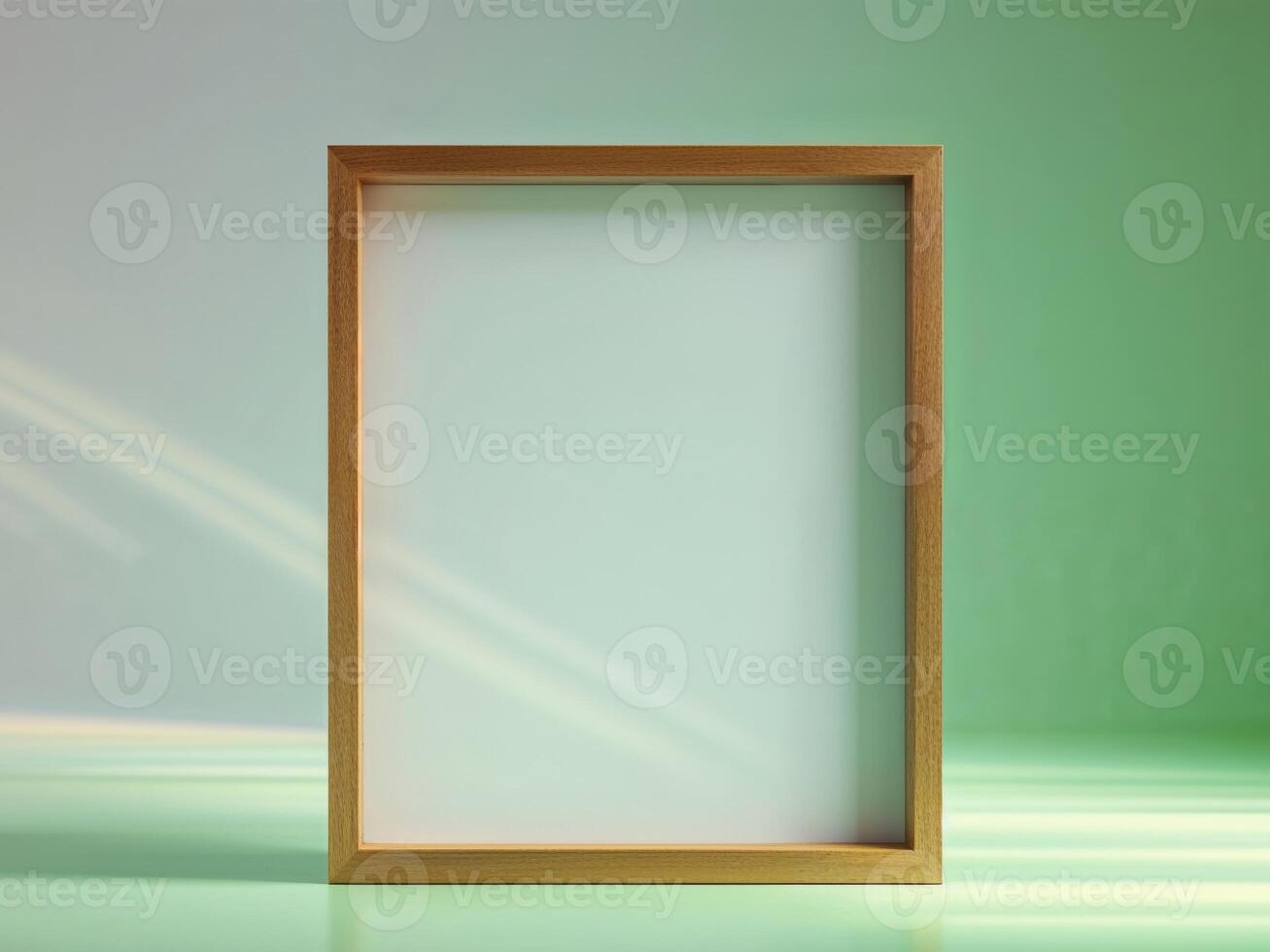 A empty wooden frame on a green surface photo