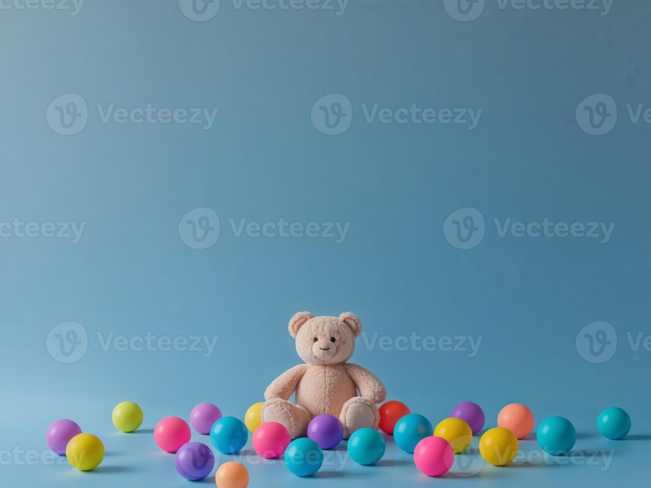 A teddy bear surrounded by colorful eggs photo
