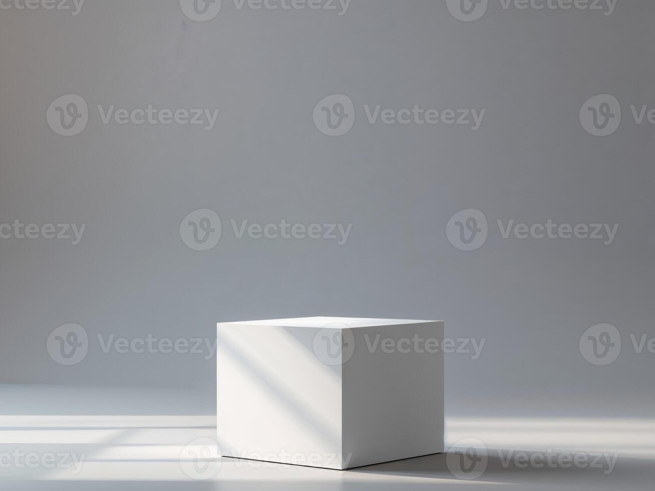 A white cube sitting on a floor in front of a window photo