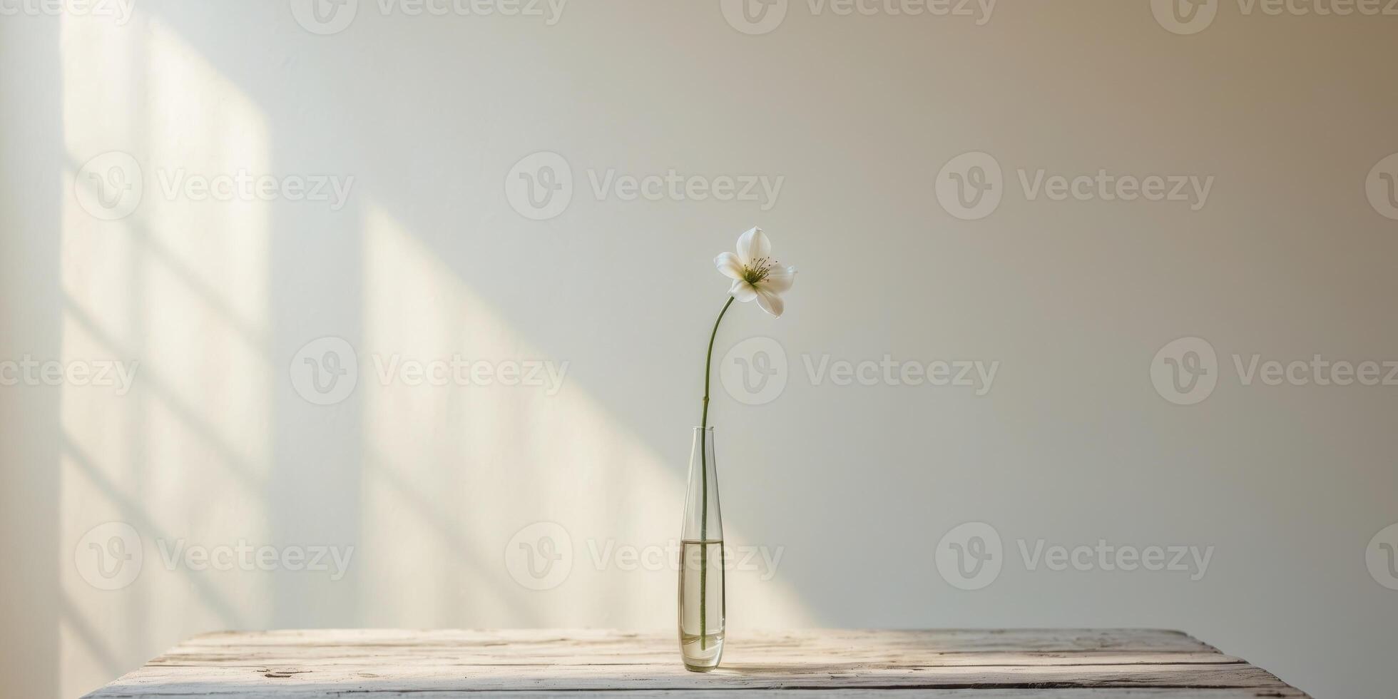 Vase with flower on table in bright room with natural light and soft background photo