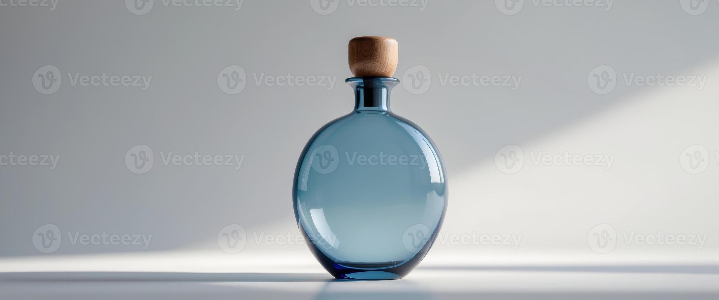 a close up of a blue flask with a wooden top photo